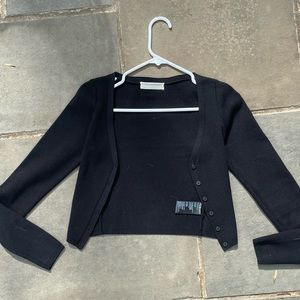 Urban Outfitters cropped black cardigan in a size XS
